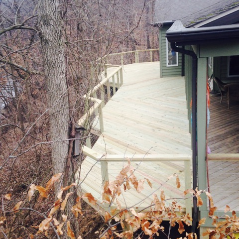 Treated wood deck with cable railing