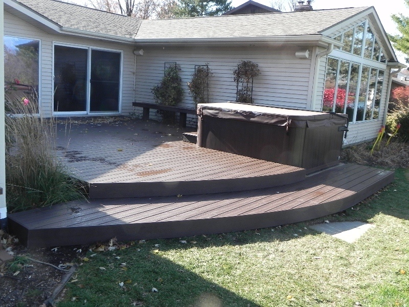 ground deck with steps to backyard